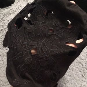 Black Cato shirt with designed holes in the shoulder